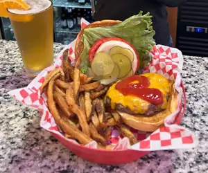 Cheeburger with fries and a beer
